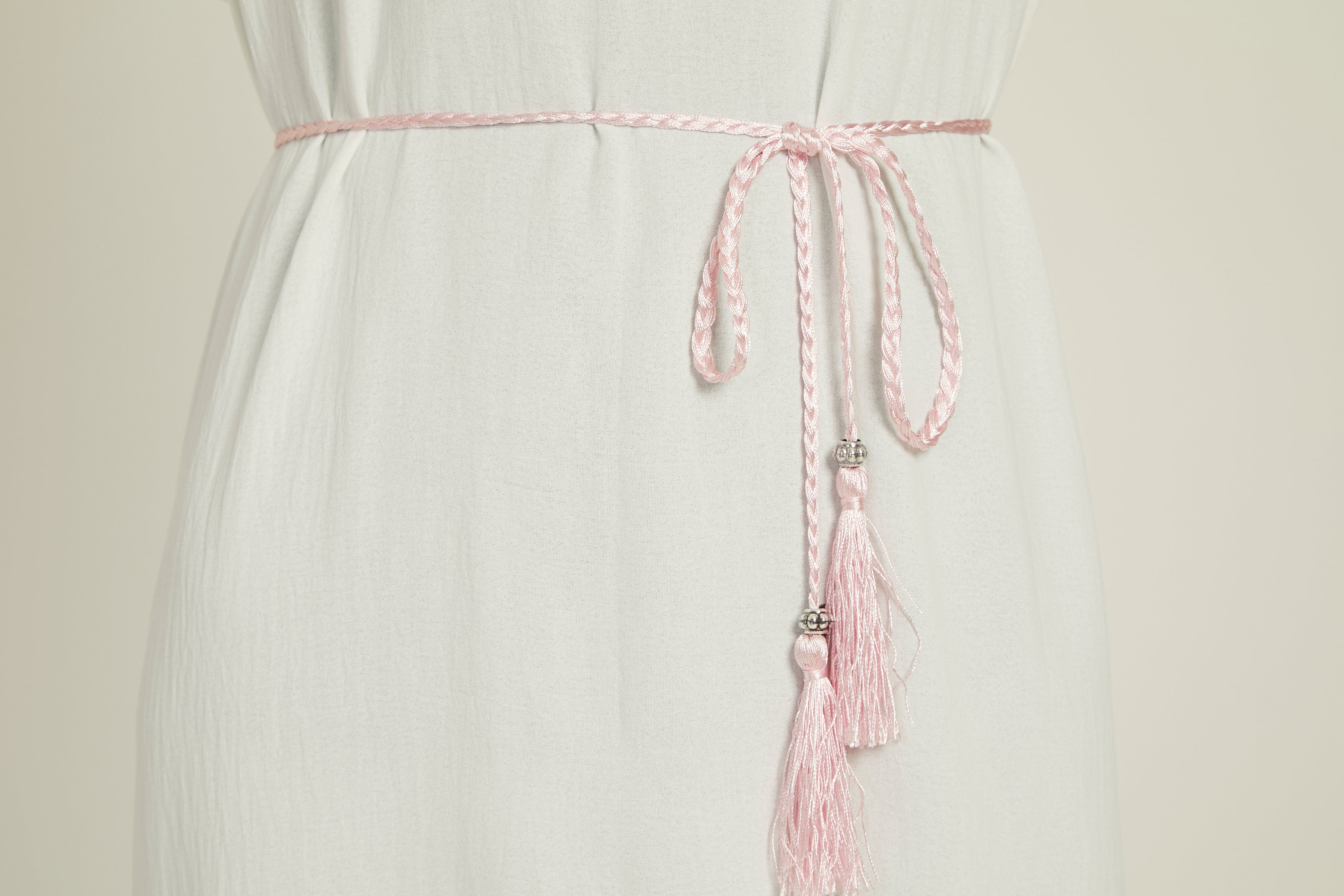 Ceinture Rose Pâle Fine à Cordon Tressé et Pompon